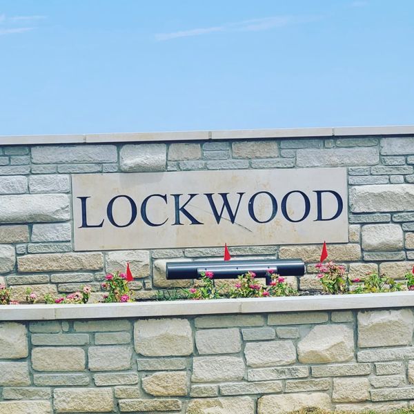 Entrance to the Lockwood community in Collierville, TN, featuring signage and landscaping (Image 1). Entrance to the Lockwood community in Collierville, TN, featuring signage and landscaping (Image 1).