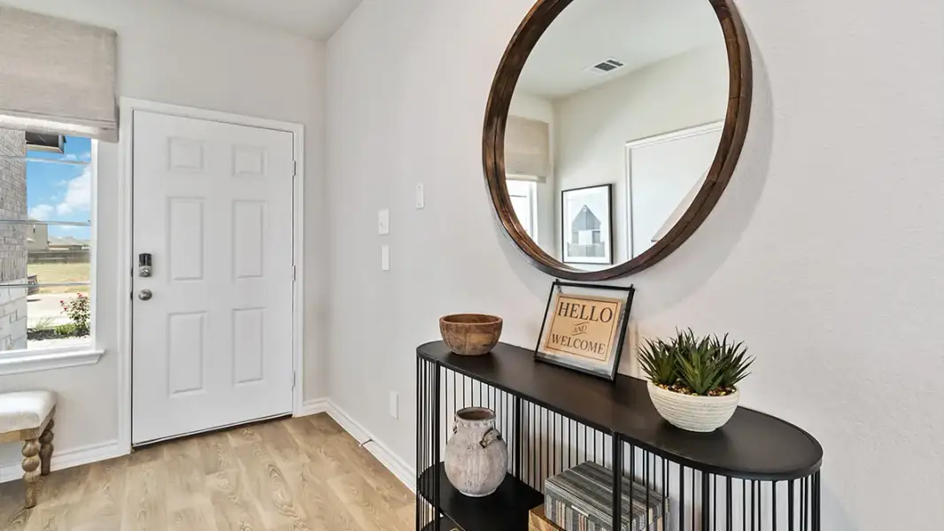 Furnished interior in a model home at Saddle Ridge Estates in Lytle (Image 3).