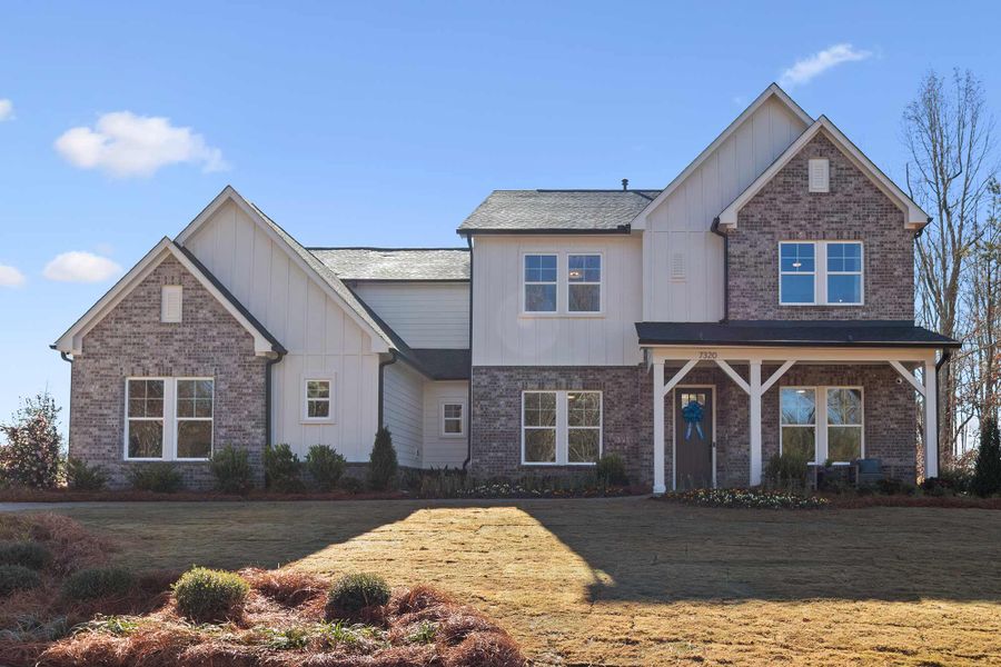 Front exterior of a home in the Meadow Brook Farms community, located in Cumming, GA (Image 4).