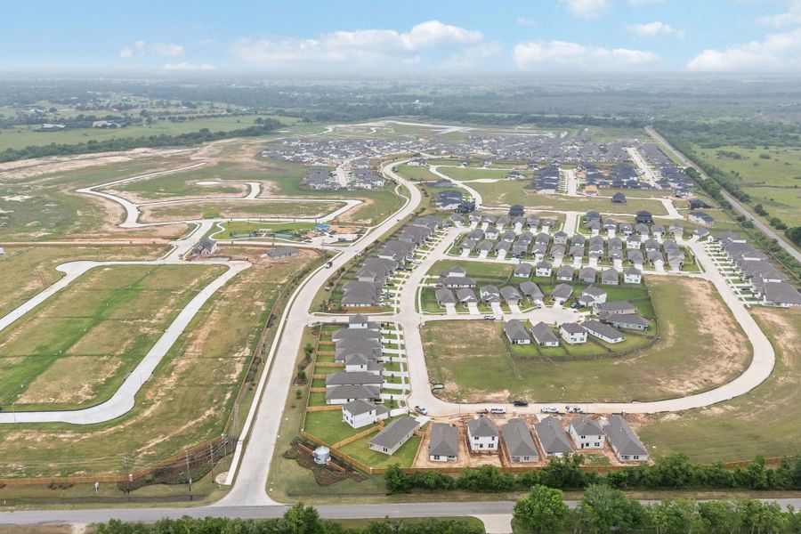 Aerial view of the Bluestem community in Brookshire, TX, showing layout and nearby surroundings (Image 13). Aerial view of the Bluestem community in Brookshire, TX, showing layout and nearby surroundings (Image 13).