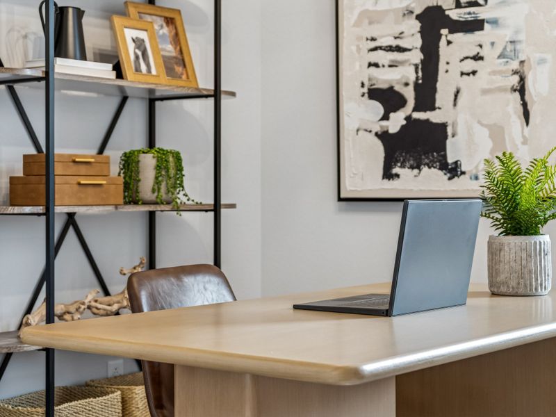 A laptop on a table.