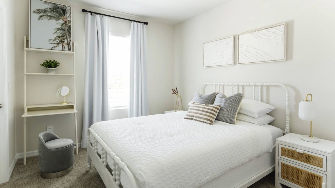 Furnished interior in a model home at Village Oaks in Clearwater (Image 9).