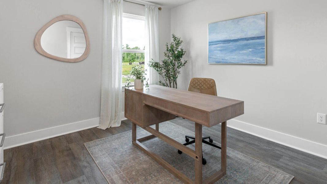 Furnished interior in a model home at Eagle Creek in Bolivia (Image 21).