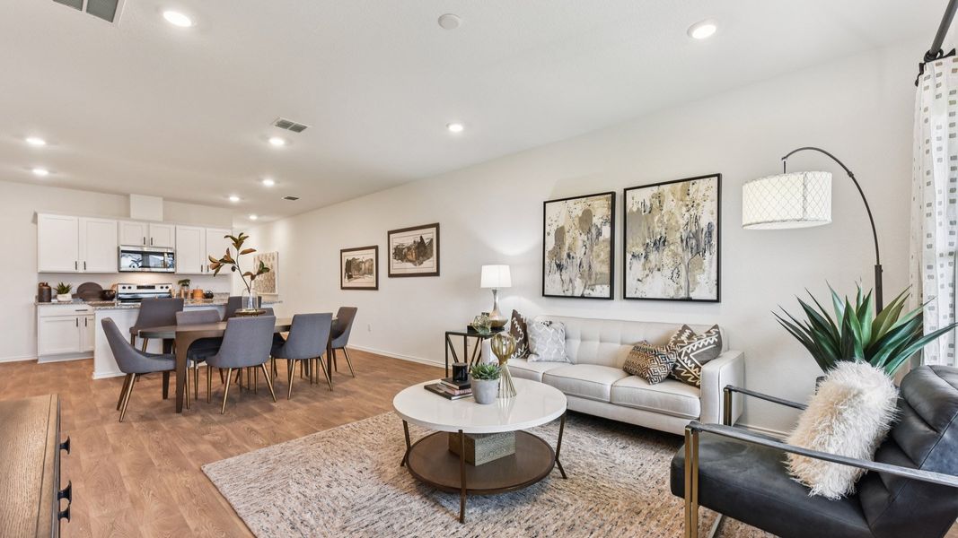 Furnished interior in a model home at Palomino in Manor (Image 8).