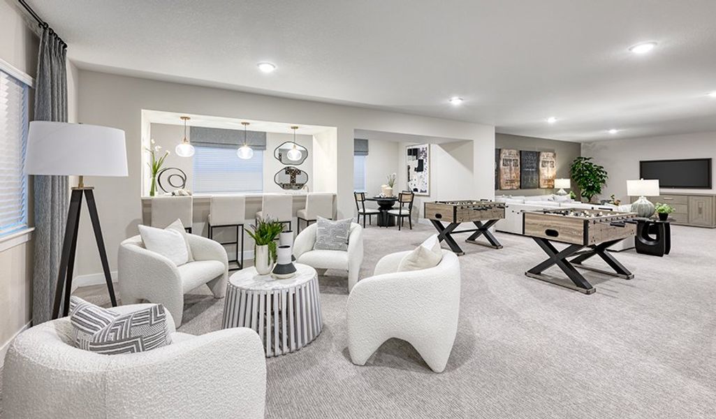 Furnished interior in a model home at Chateau at the Meadows in Castle Rock (Image 16).