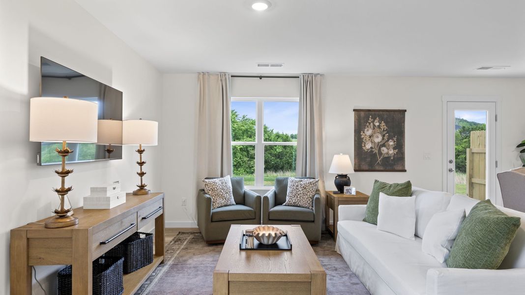 Furnished interior in a model home at Owensby Farms Townhomes in Dayton (Image 9).