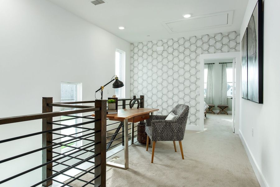 Furnished interior in a model home at Windsong Ranch Townhomes in Prosper (Image 36).