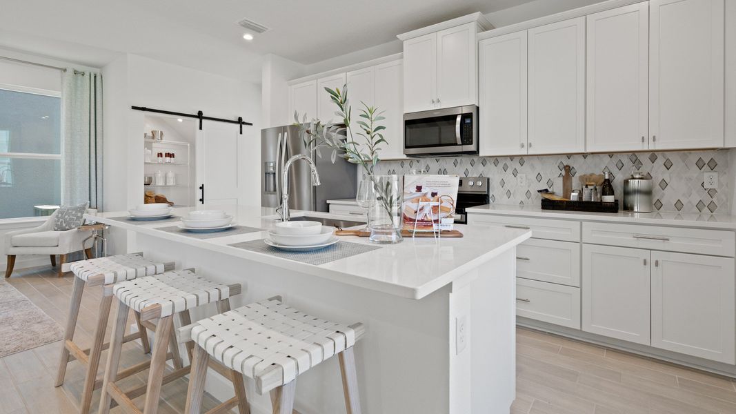 Trinity Place Staged Model Ambersweet Kitchen by DRB Homes in Saint Cloud FL Trinity Place Staged Model Ambersweet Kitchen by DRB Homes in Saint Cloud FL