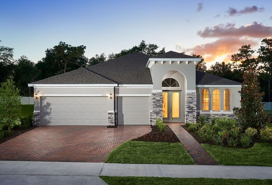 Front exterior of a home in the Tamarack at Two Rivers community, located in Zephyrhills, FL (Image 12).