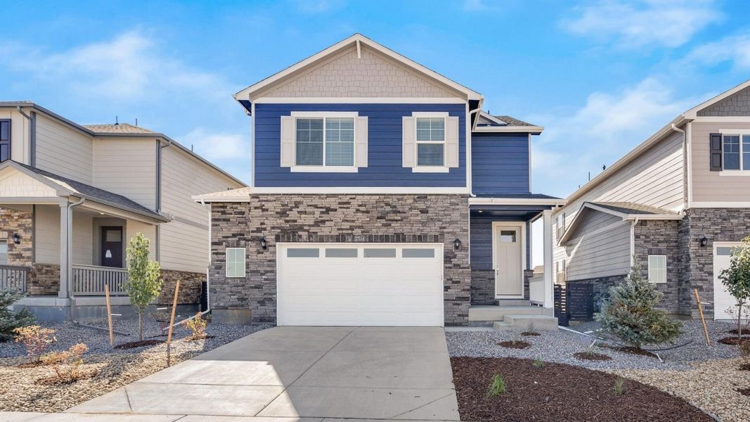 Front exterior of a home in the The Ridge at Lorson Ranch community, located in Colorado Springs, CO (Image 4).