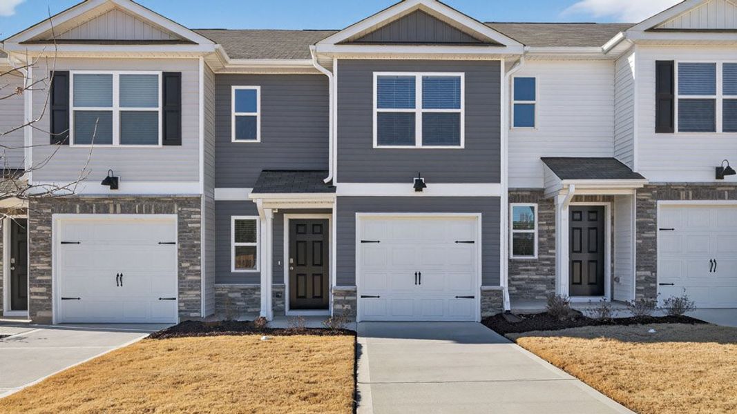 Front exterior of a home in the The Townes at Martin Farms community, located in Aberdeen, NC (Image 8).
