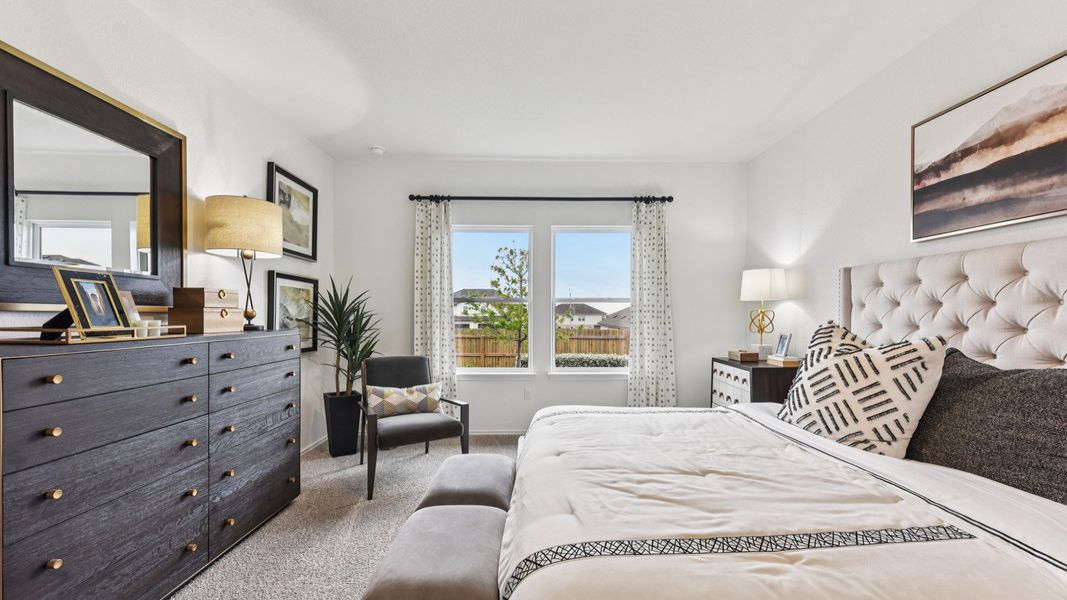 Furnished interior in a model home at Palomino in Manor (Image 27).