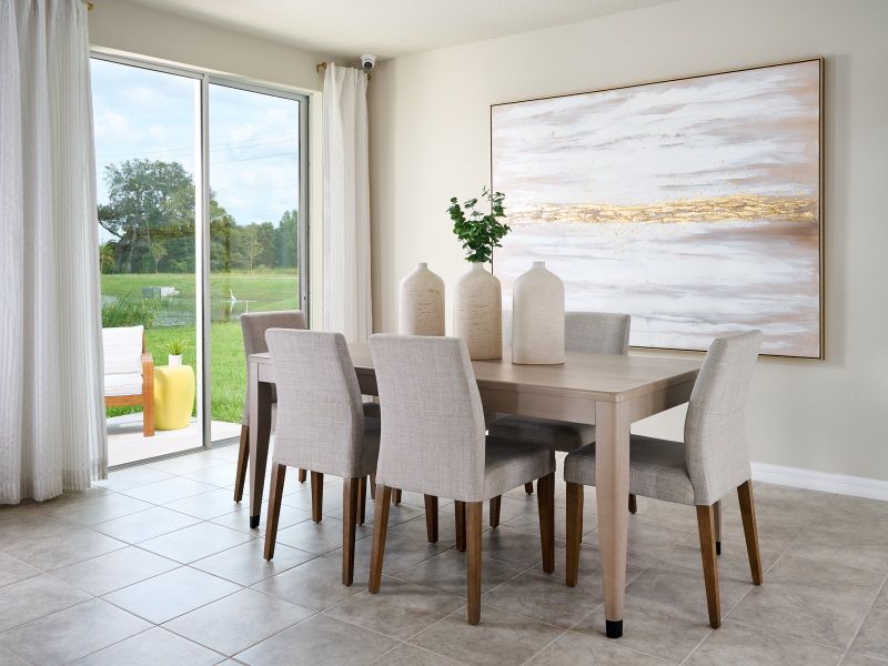 Dining area of the Foxglove plan modeled at Lantana Grove.