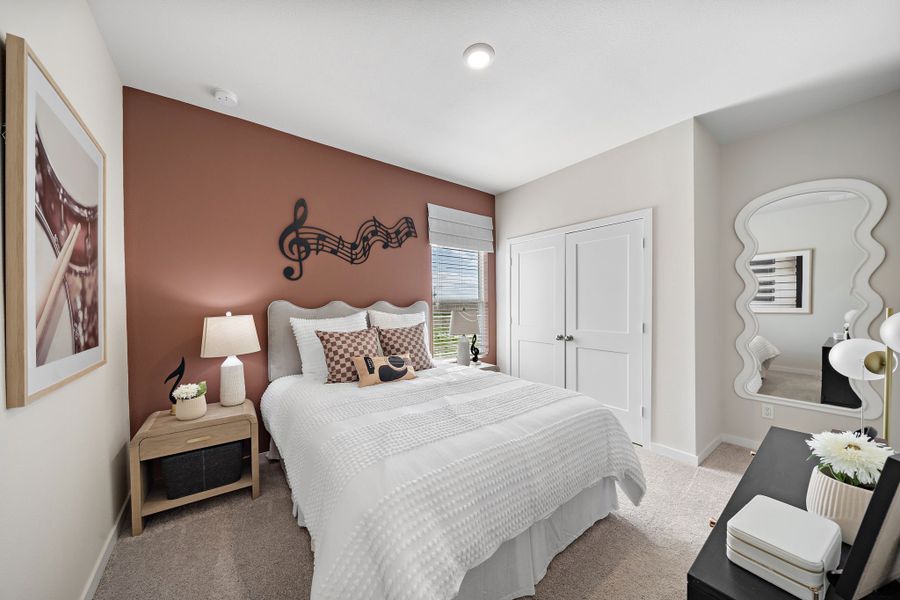 A bedroom with a large bed. A bedroom with a large bed.