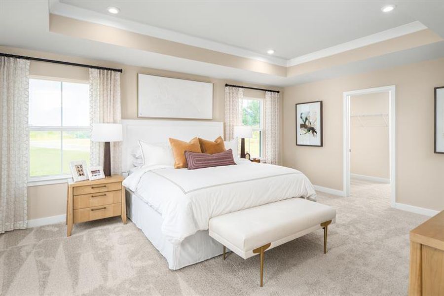 Owner’s suite with walk-in closets and spa bath creates your personal retreat.