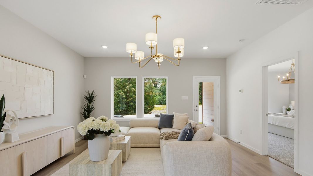 Furnished interior in a model home at Williams Reserve East in Conroe (Image 6).