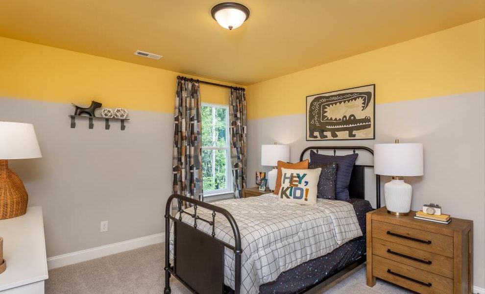 Furnished interior in a model home at Running Brook Townes in Durham (Image 14).