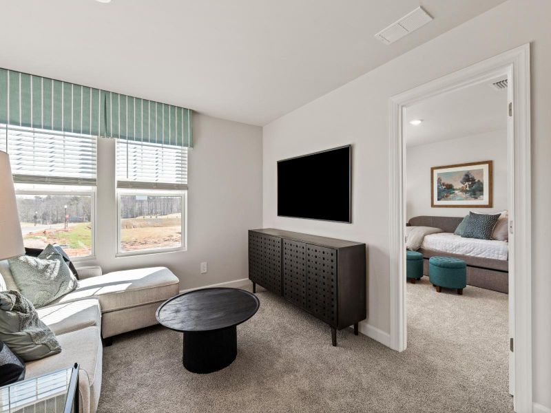 Furnished interior in a model home at Russell Grove - Rolling Hills Series in Charlotte (Image 9).