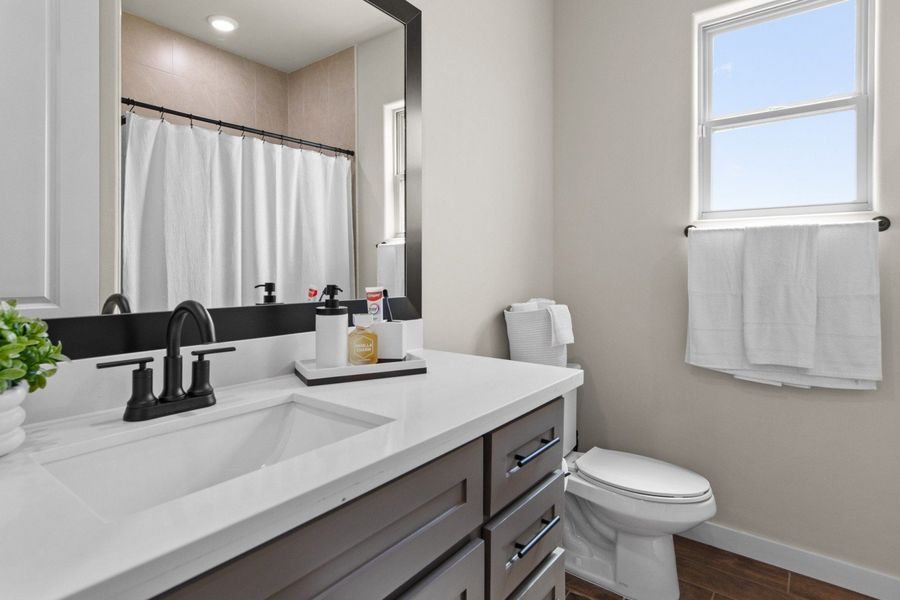 Furnished interior in a model home at Las Cruces in Alamo (Image 40).