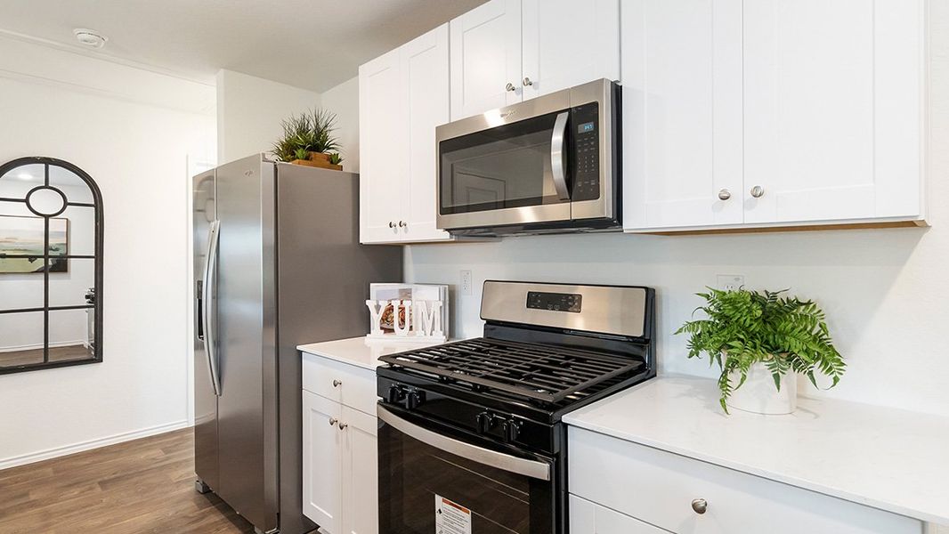 Furnished interior in a model home at Preserve at Medina in Von Ormy (Image 7).