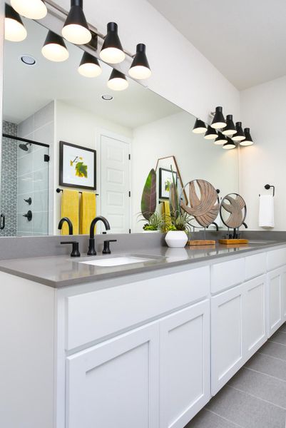 Furnished interior in a model home at Casetta Ranch in Kyle (Image 13).