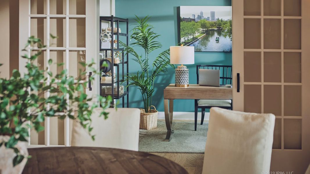 Furnished interior in a model home at The Courtyards at Holly Grove in Holly Springs (Image 11).