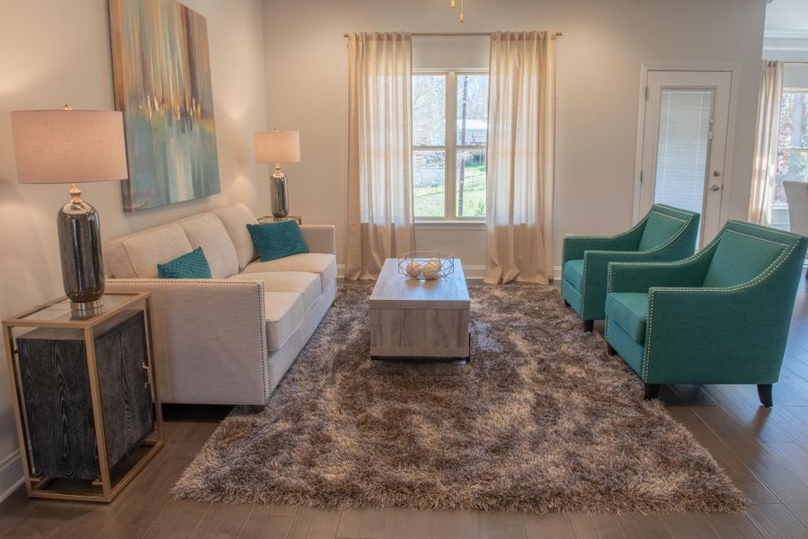 Furnished interior in a model home at Hidden Lake Preserve in Greenville (Image 7).