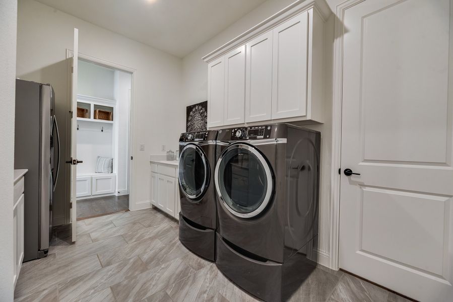 Furnished interior in a model home at King's Crossing - Phase 5 & 6 in Parker (Image 24). Furnished interior in a model home at King's Crossing - Phase 5 & 6 in Parker (Image 24).