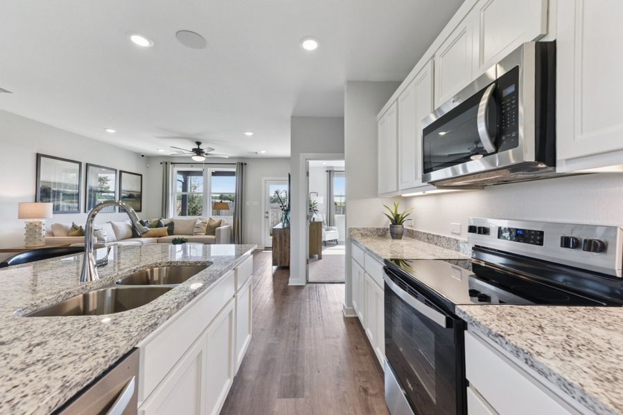 A kitchen with a large island. A kitchen with a large island.