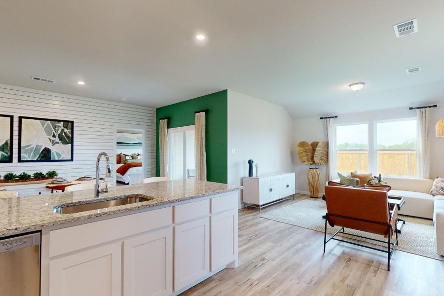 A kitchen with a large island. A kitchen with a large island.