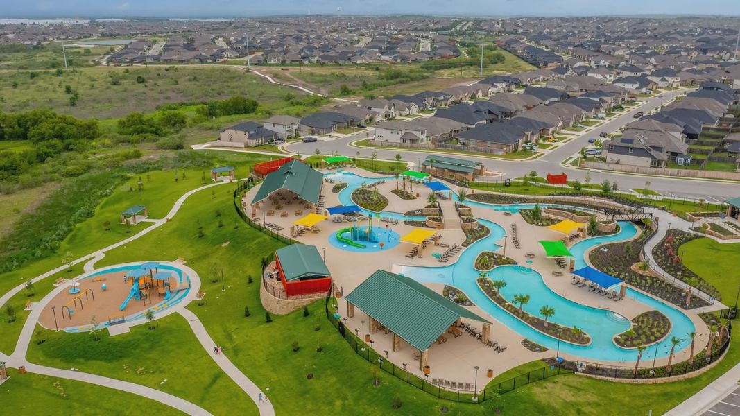 Aerial view of the Sunfield community in Buda, TX, showing layout and nearby surroundings (Image 12). Aerial view of the Sunfield community in Buda, TX, showing layout and nearby surroundings (Image 12).