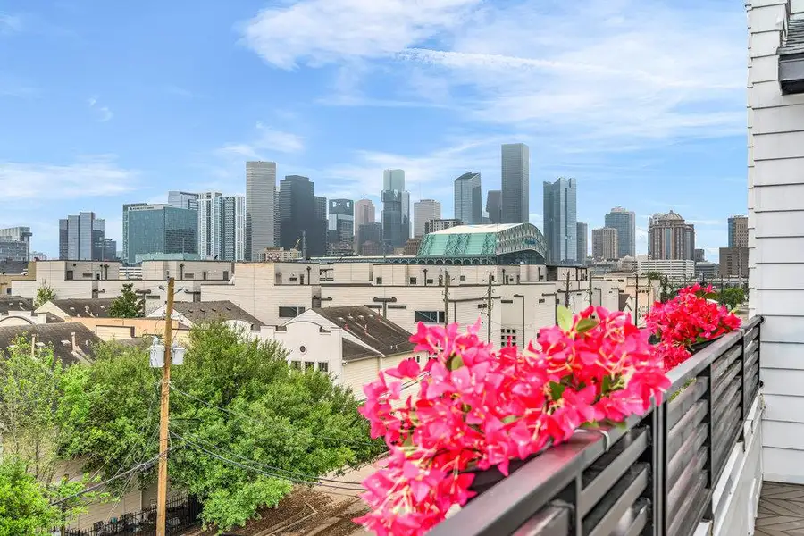 Front exterior of a home in the Commerce Row community, located in Houston, TX (Image 1). Front exterior of a home in the Commerce Row community, located in Houston, TX (Image 1).