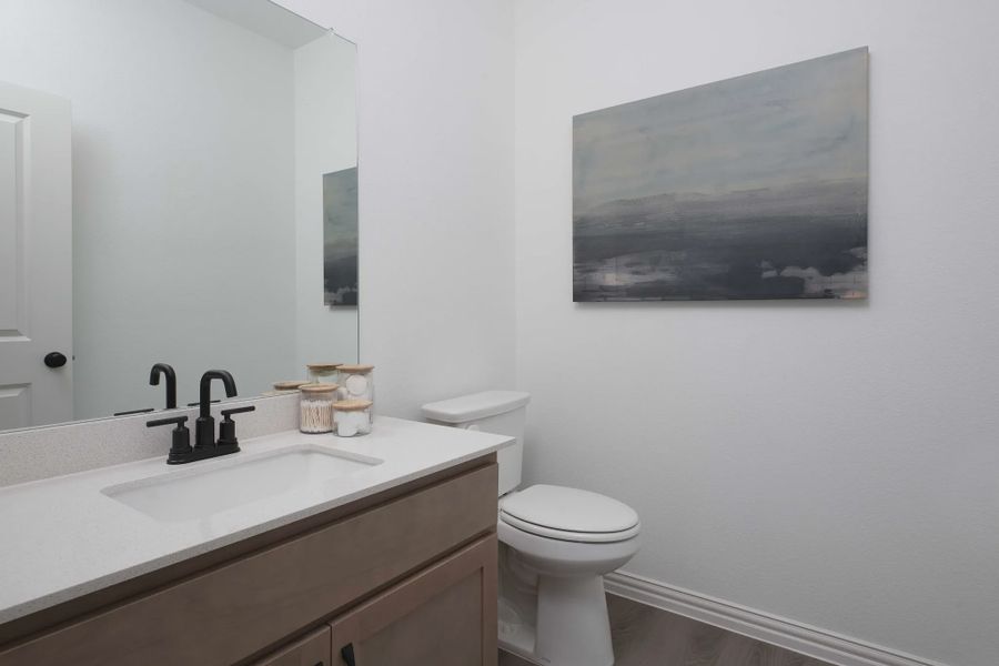 Furnished interior in a model home at Creekview Fossil Ridge in Pilot Point (Image 8). Furnished interior in a model home at Creekview Fossil Ridge in Pilot Point (Image 8).