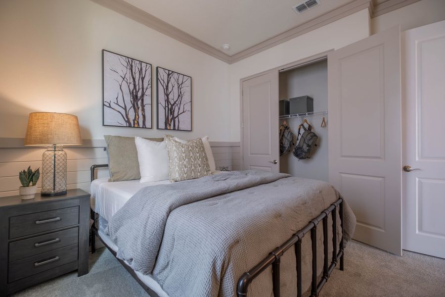 Furnished interior in a model home at Legends Preserve in Daytona Beach (Image 7).