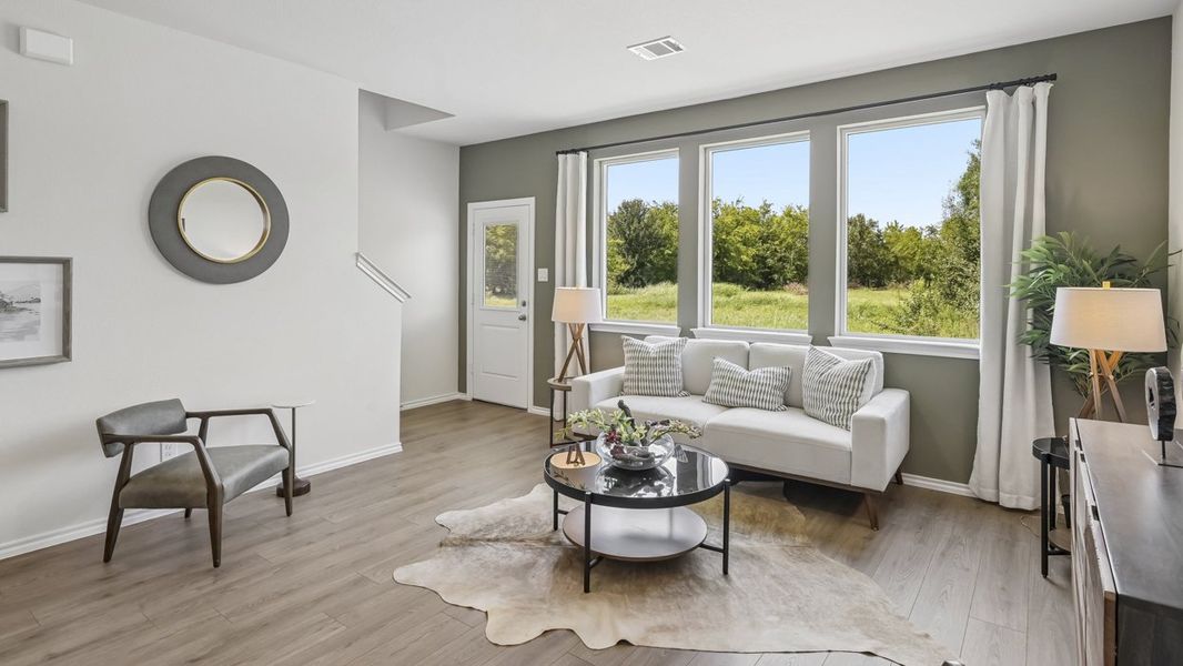 Furnished interior in a model home at Stonewood in Sulphur Springs (Image 7).