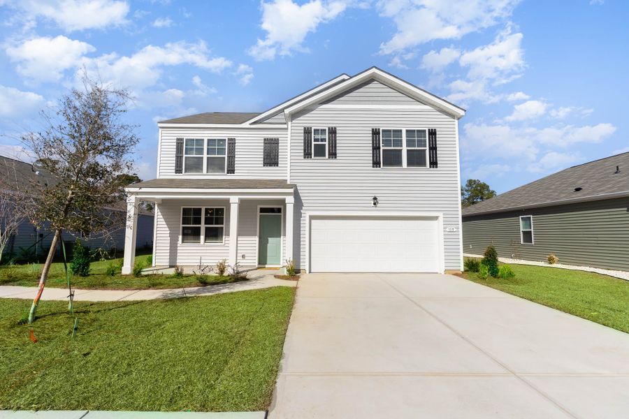 Front exterior of a home in the Island Green community, located in Myrtle Beach, SC (Image 12).