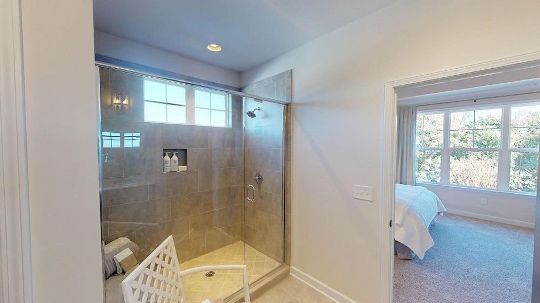 The Main Bathroom features a large walk-in shower.