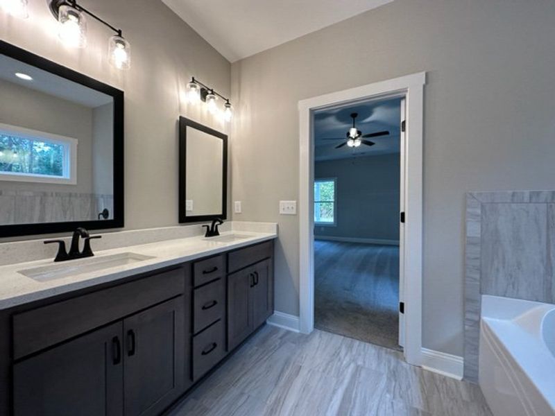 Furnished interior in a model home at Polk Place in Moreland (Image 18).