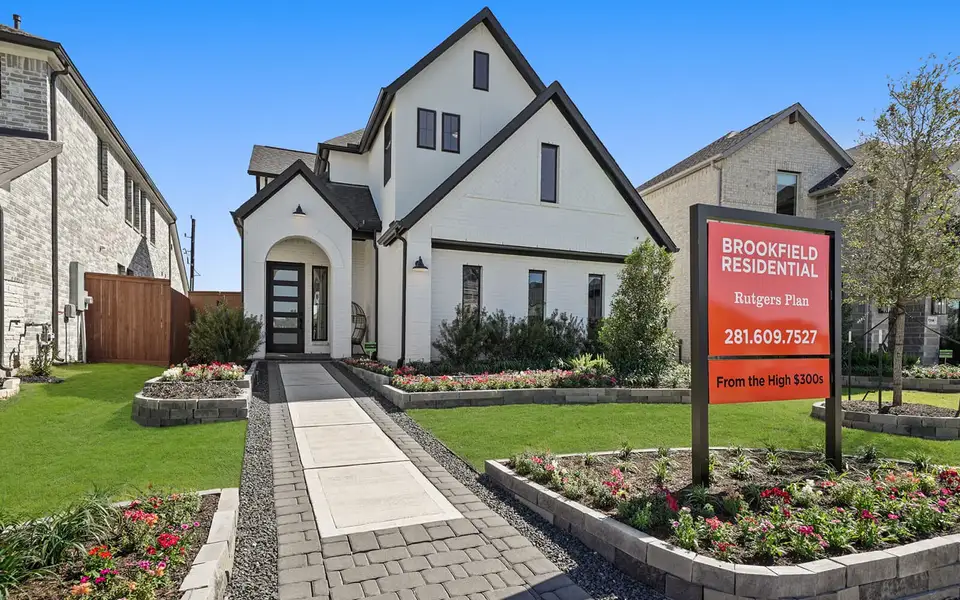 Front exterior of a home in the 50' Traditional Homes at Elyson community, located in Katy, TX (Image 2).