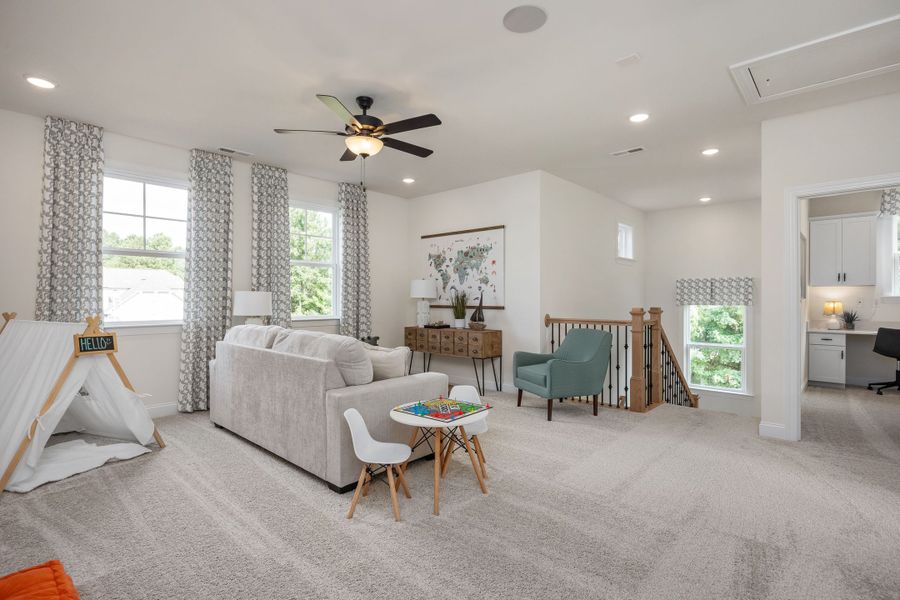 Furnished interior in a model home at Ashland in New Hill (Image 25).