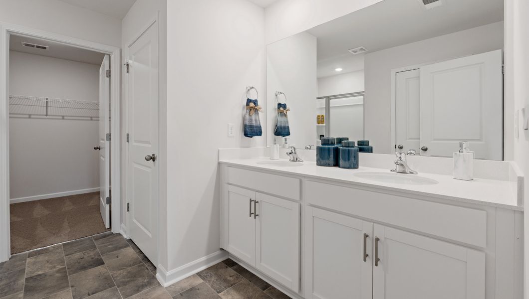 Furnished interior in a model home at Bentley Park in Greenwood (Image 28).