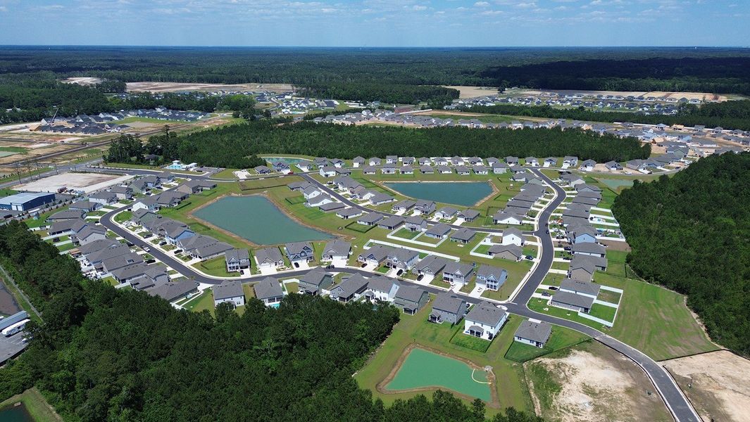 Aerial view of the Eden Springs community in Longs, SC, showing layout and nearby surroundings (Image 13).