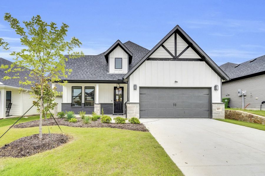 Front exterior of a home in the Hadley Farms community, located in Godley, TX (Image 11). Front exterior of a home in the Hadley Farms community, located in Godley, TX (Image 11).