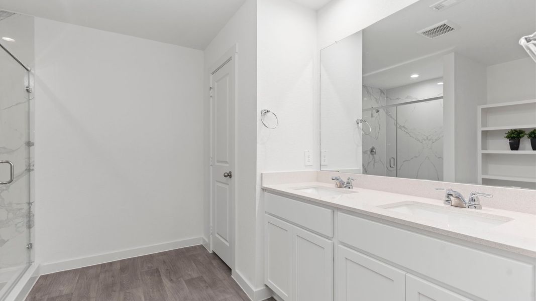 Furnished interior in a model home at August Trails in Needville (Image 24).