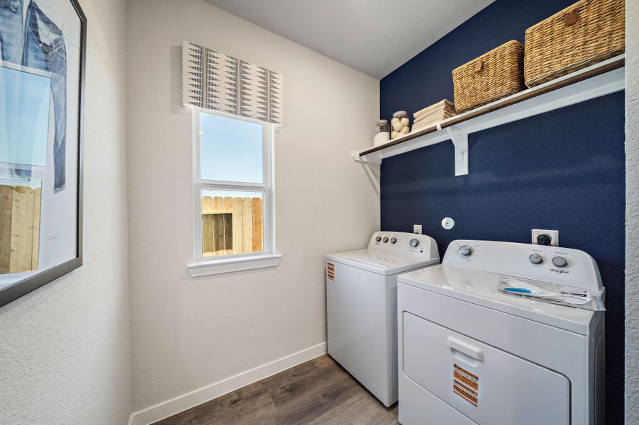 A laundry room with a laundry basket.