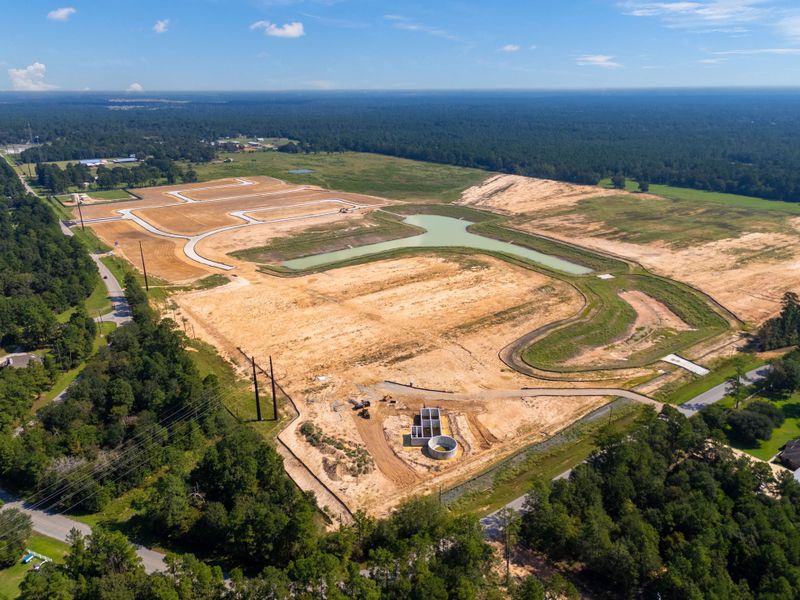 A landscape with a river and trees.