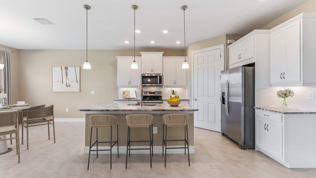 Furnished interior in a model home at Cape Coral Signature in Cape Coral (Image 30).