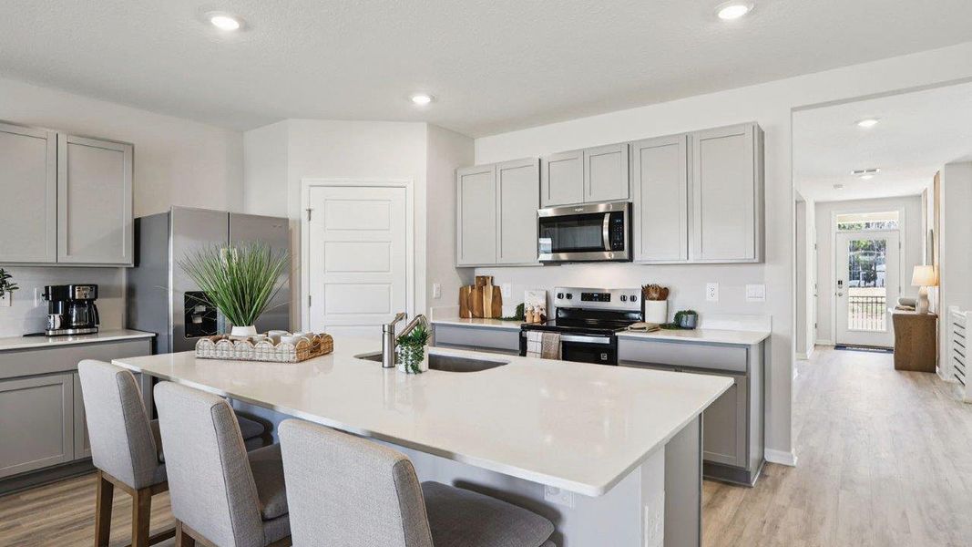 Furnished interior in a model home at Sun N Lake in Sebring (Image 7).