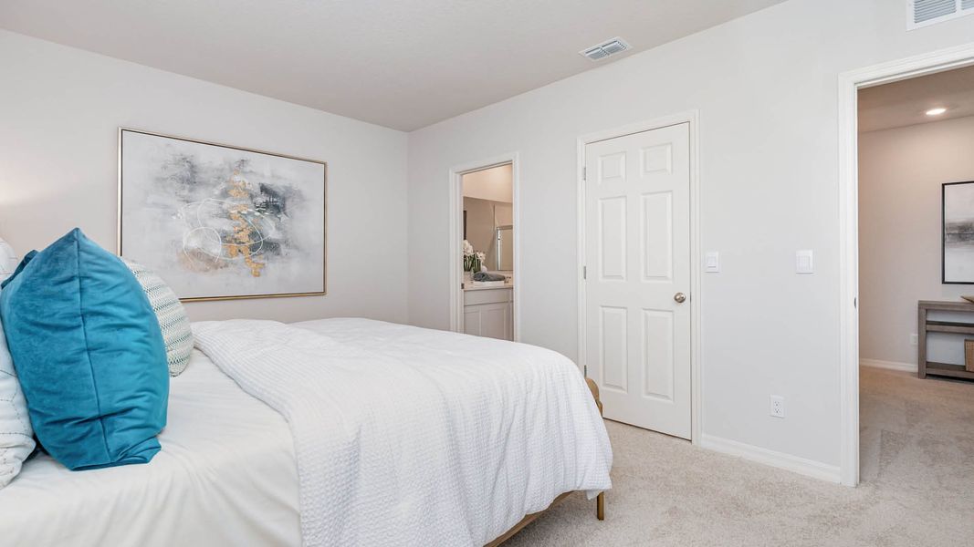 Furnished interior in a model home at Central Park Townhomes in Port St. Lucie (Image 28).