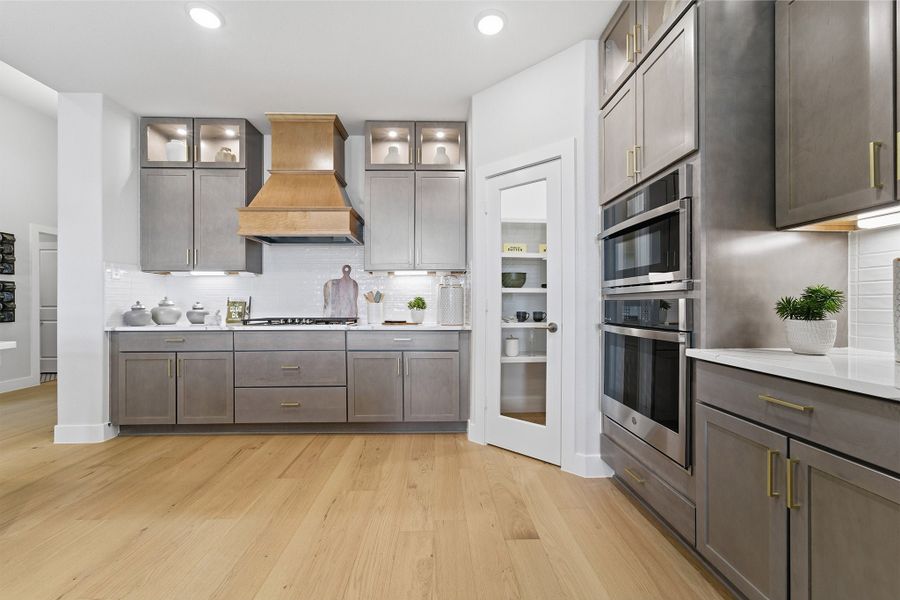 Furnished interior in a model home at Sundance Cove in Crosby (Image 38).